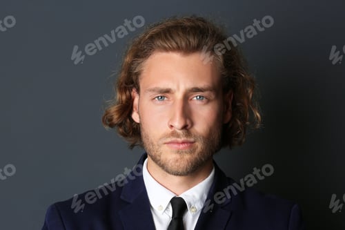 Preview: Portrait of handsome man on dark background