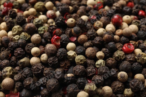 Preview: Aromatic spices. Different peppers as background, closeup