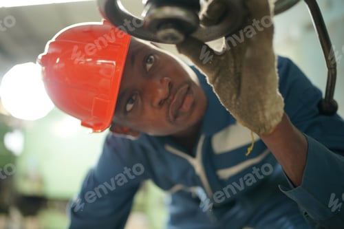 Preview: industrial factory employee working in metal manufacturing industry