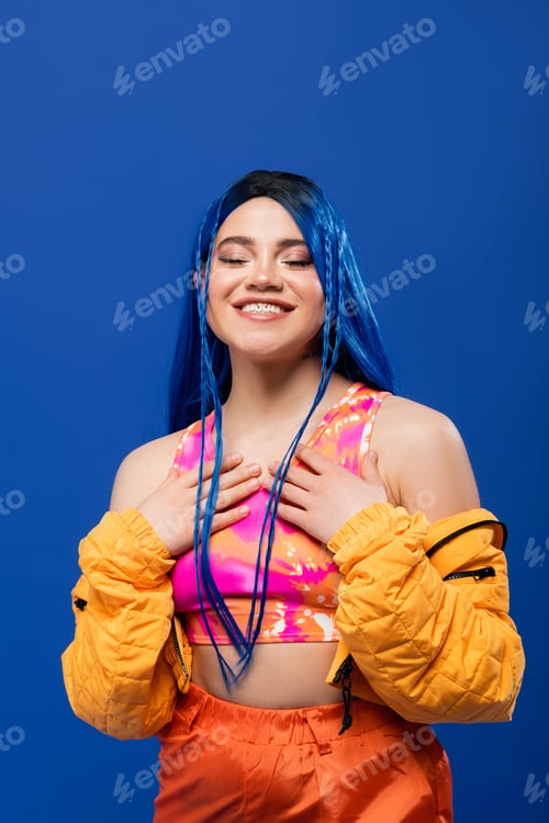 Preview: vibrant clothes, dyed hair, female model with blue hair posing