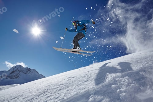 Preview: Male freestyle skier jumping mid air from mountainside, Zugspitze, Bayern, Germany