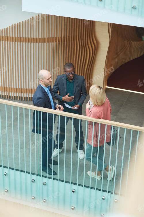Preview: Business people talking to each other