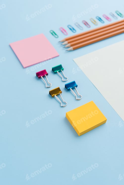 Preview: Office supplies on the blue background table