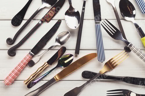 Preview: Collection of modern and antique cutlery, top view