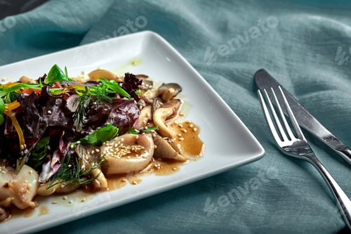 Preview: Salad of squid, mushrooms, and vegetables. The view from the top. Copy-space.