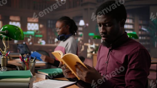 Preview: African american guy studies for a critical law exam and reading specialty books