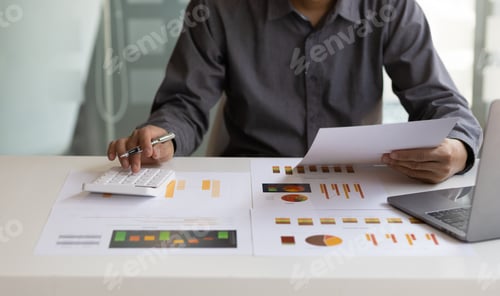 Preview: Businessman working with business report papers, financial analysis accounting statement.