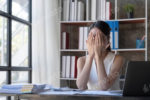 Preview: Young Business Asian women are stressed while working on laptop, Tired asian businesswoman with