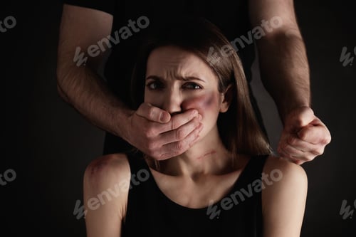 Preview: Man abusing scared woman on black background. Domestic violence