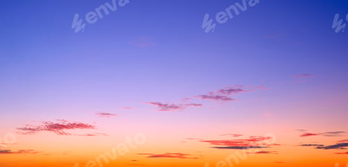 Preview: Sunrise sky with orange sunlight and cloud on colorful romantic sky background in panoramic view