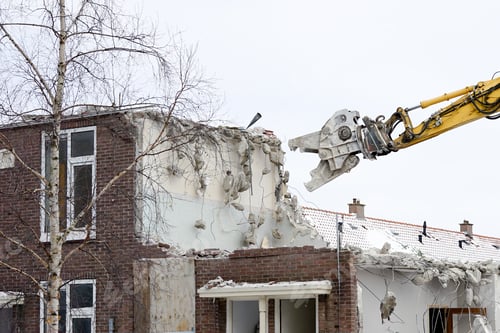 Preview: Demolished house. Construction site, heavy machinery and construction.