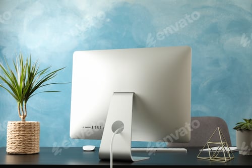 Preview: Workplace with computer and plants on black wood table, and chair, space for text