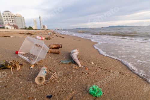 Preview: Spilled garbage on beach is dirty plastic bottles it make dirty sea sandy shore environmental pollut