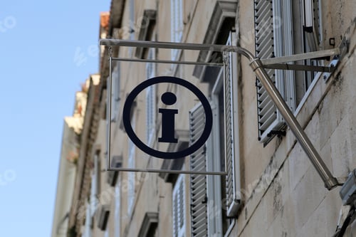 Preview: Selective focus shot of reference office with Information plate on the street of the city