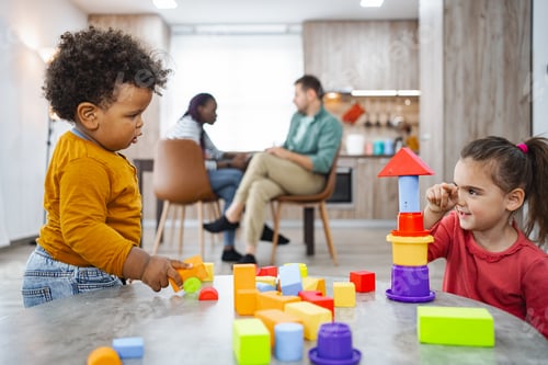 Preview: Multi racial family enjoying creative playtime at home