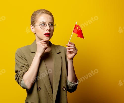 Preview: Style blonde woman in jacket with Chinese flag on yellow background
