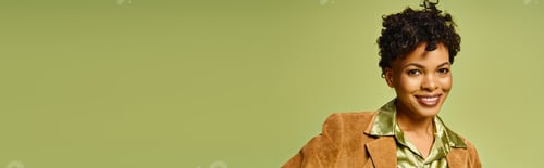 Preview: Stylish african american woman posing confidently in a modern green setting