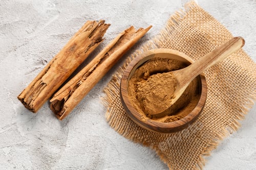 Preview: Ground Cinnamon Sticks Wooden Bowl Rustic Background