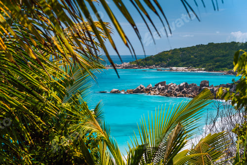 Aperçu: Coastline of La Digue island in Seychelles. Grand and Petite Anse paradise beaches with blue ocean
