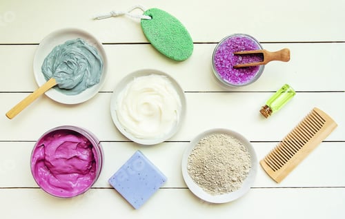 Preview: Cosmetic objects for spa procedures on a white background. Selective focus.