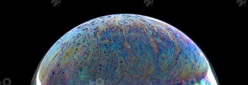 Preview: Close-up shot of a soap bubble in the dark