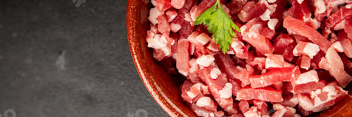 Preview: Bacon cubes smoked chopped meat small pieces fresh delicious gourmet food background