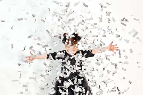 Preview: Party, holidays, new year and celebration concept - Female child throwing confetti