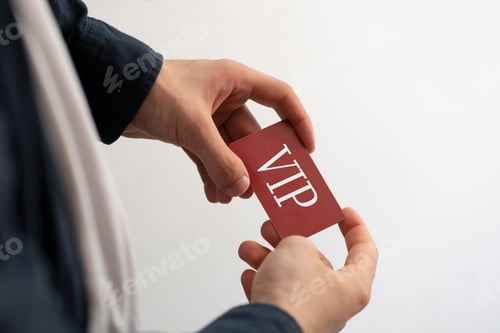 Preview: a person showing VIP card pass, exclusive access membership