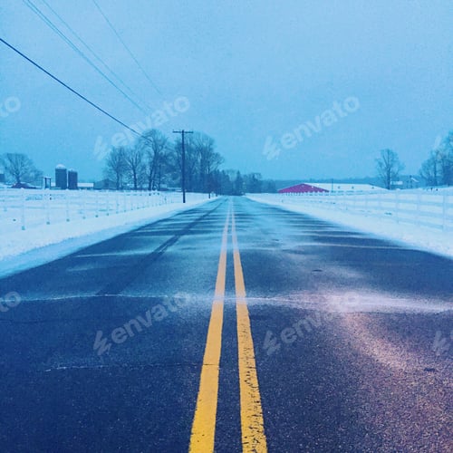 Preview: Winter Road Through a Snowy Rural Landscape