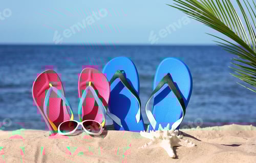 Preview: Composition with beach accessories on sand near sea in summer