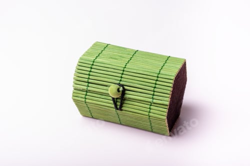 Preview: Green toy, closed wicker chest, container. Chest for secrets, treasure, games with children