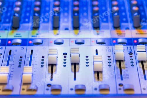 Preview: Close up detail of a desk mixer for mixing audio
