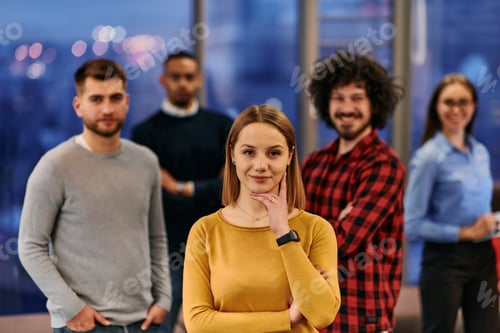 Preview: Portrait of successful creative business team looking at camera and smiling. Diverse business people