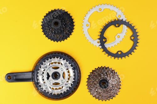 Preview: Set of different bicycle parts on color background, flat lay