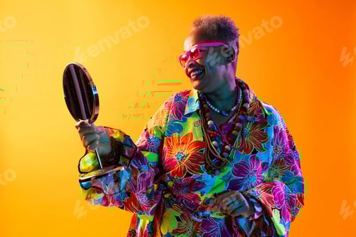 Preview: Funny senior black woman wearing stylish clothing isolated in studio