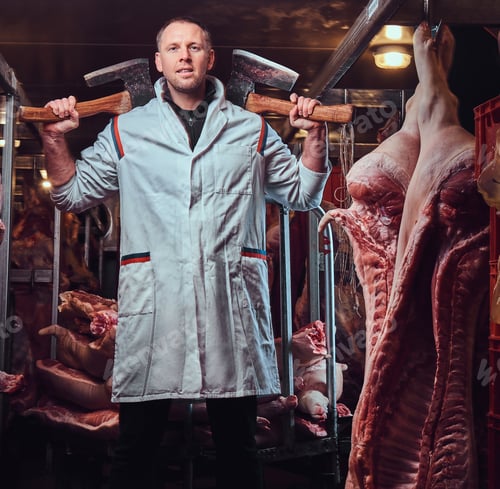 Preview: The butcher in a meat factory.