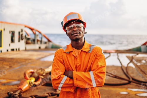 Preview: happy Seaman AB or Bosun on deck of vessel or ship