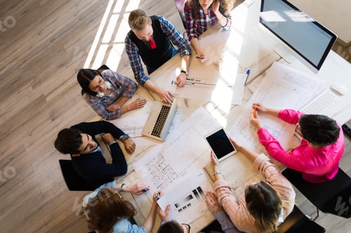 Preview: Picture of young architects discussing in office