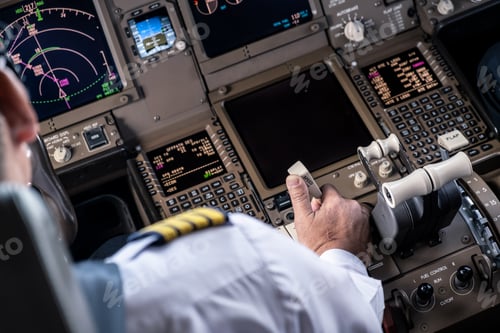 Preview: He pulling spreed brake lever to slow down the aeroplane speed by right hand.