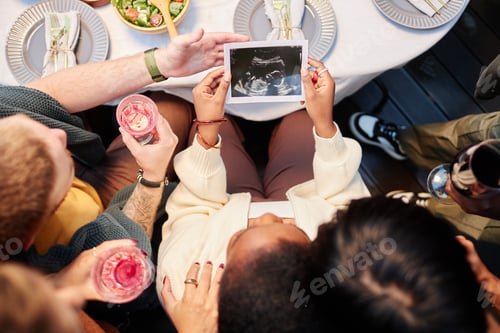 Preview: Friends Looking at Baby Ultrasound