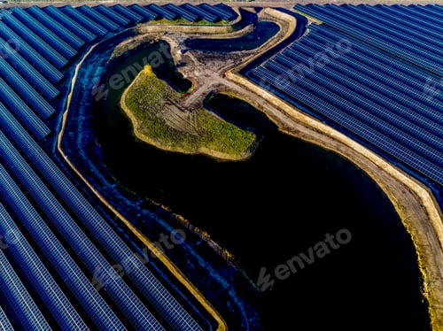 Preview: Aerial view of a solar farm with winding waterway