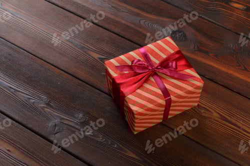 Preview: gift box on wooden background