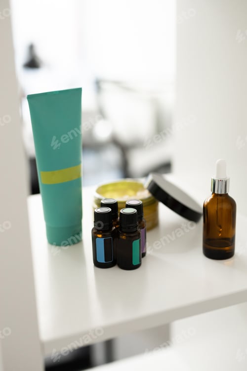 Preview: Close up of body care cosmetic products on shelf in cosmetology. Spa and piling cosmetics