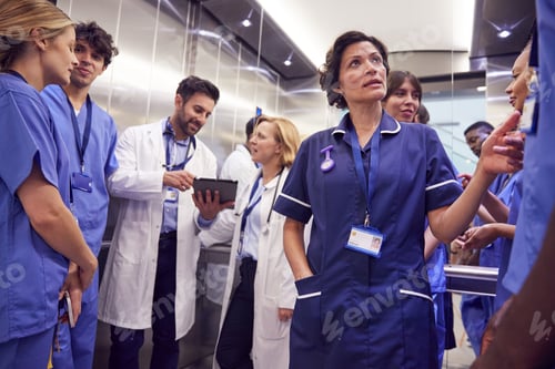 Preview: Medical Team In Hospital Elevator About To Perform Operation