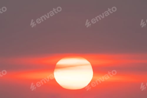 Preview: Sunset sky. Abstract nature background. Dramatic blue and orange, colorful clouds at twilight time.