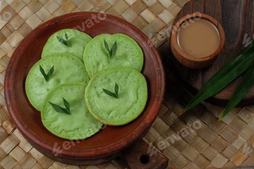 Preview: serabi or surabi - indonesian pancake,made from rice flour, coconut milk and served with brown sugar