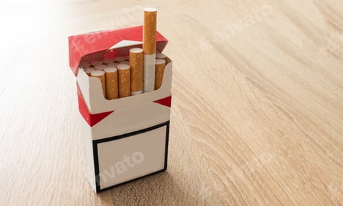 Preview: Pack of cigarettes on wooden textured table