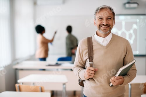 Preview: Portrait of happy mature student in the classroom looking at camera.