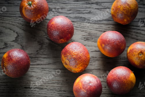 Preview: Red tangerines on the wooden background