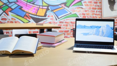 Preview: open books and laptop on the table